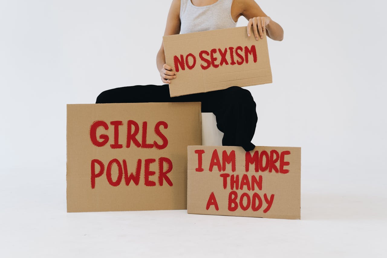 Studio shot of protest signs advocating women's empowerment and equality.